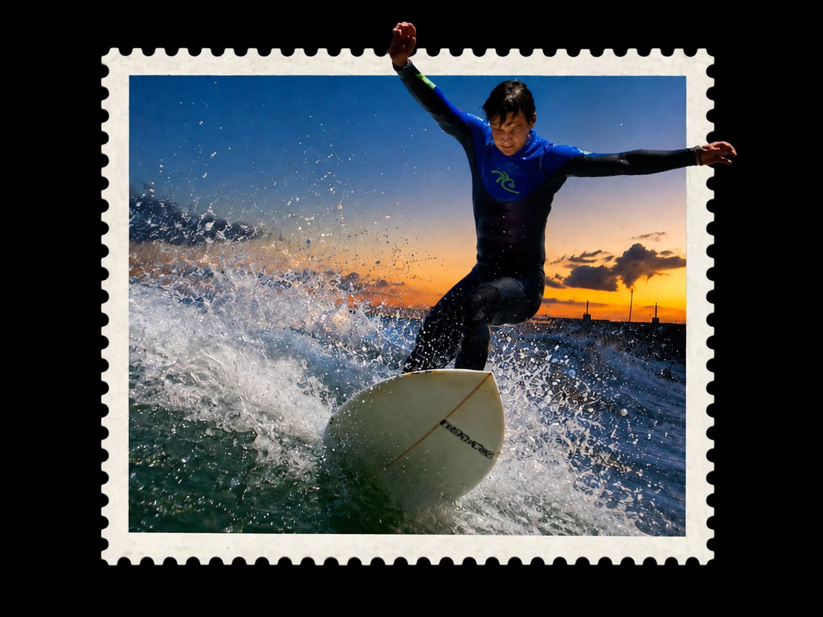 Surfer riding a wave at sunset