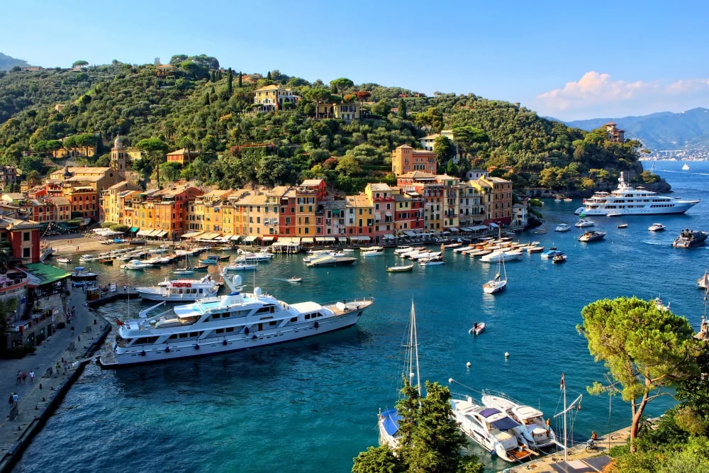 Yachts docked in the colourful harbour of Portofino